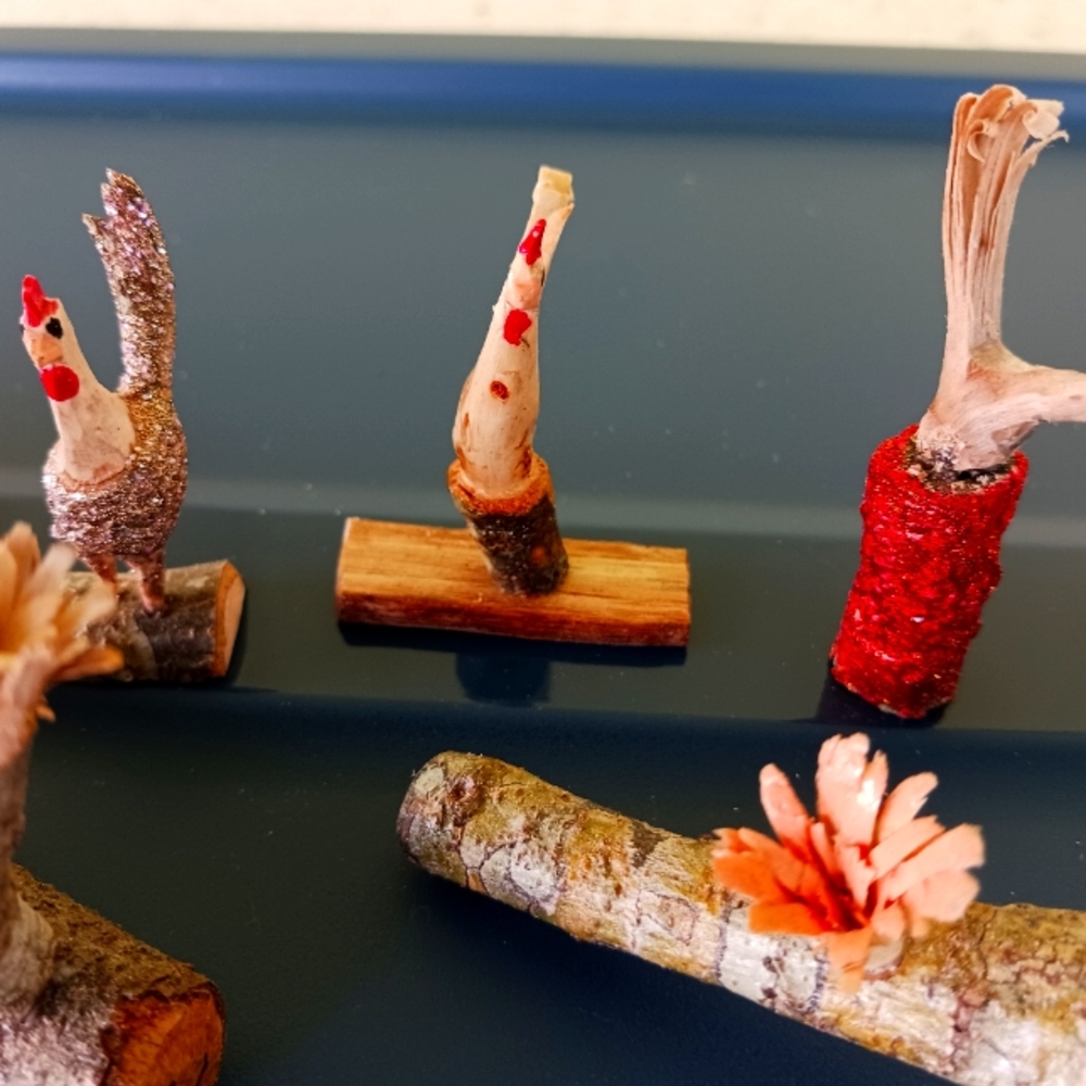 Folk art wood carvings roosters